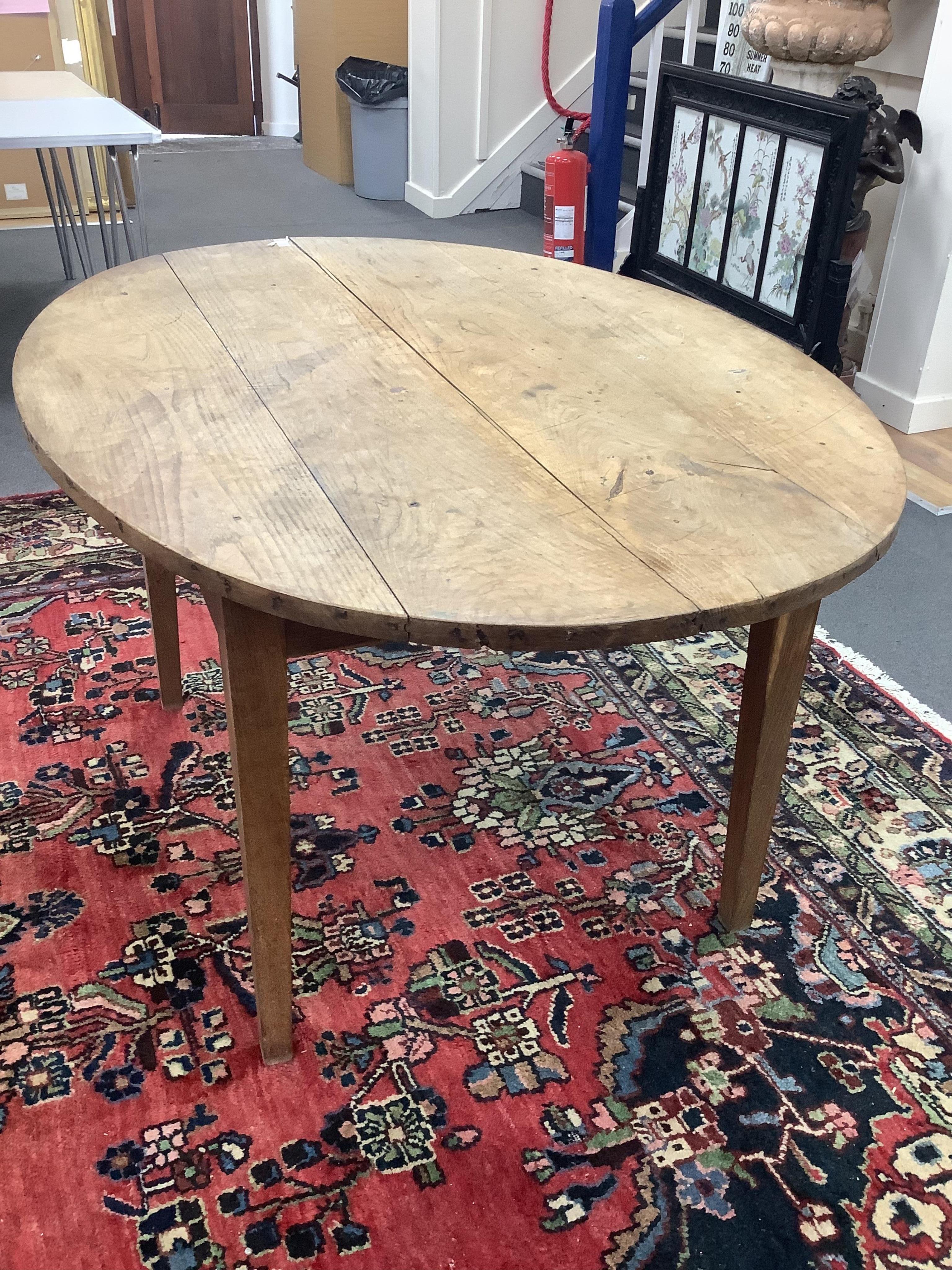 A French ash farmhouse table, width 134cm, depth 98cm, height 72cm. Condition - fair